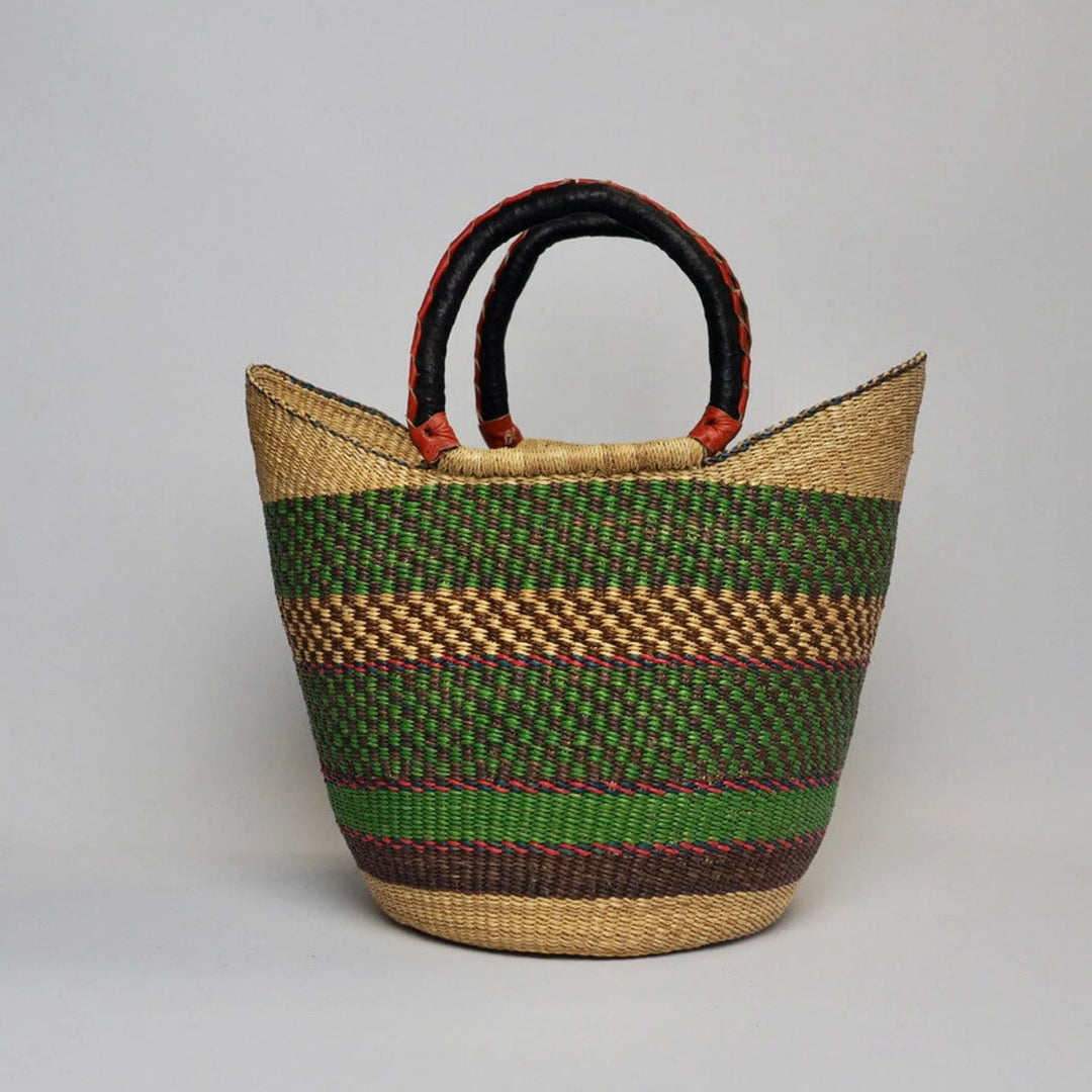 Small African basket in green and brown tones