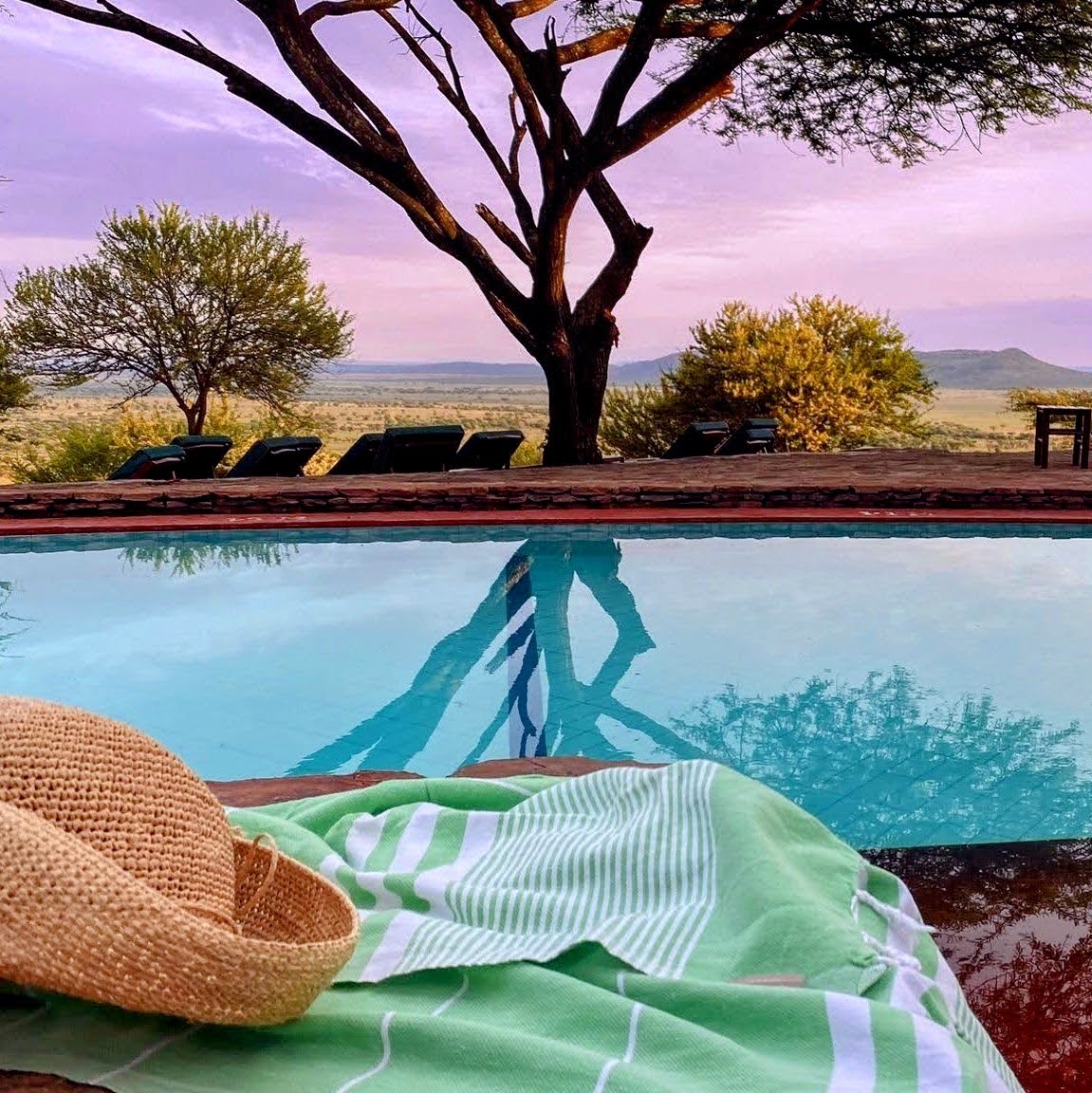 Evening time by the pool with travel towel