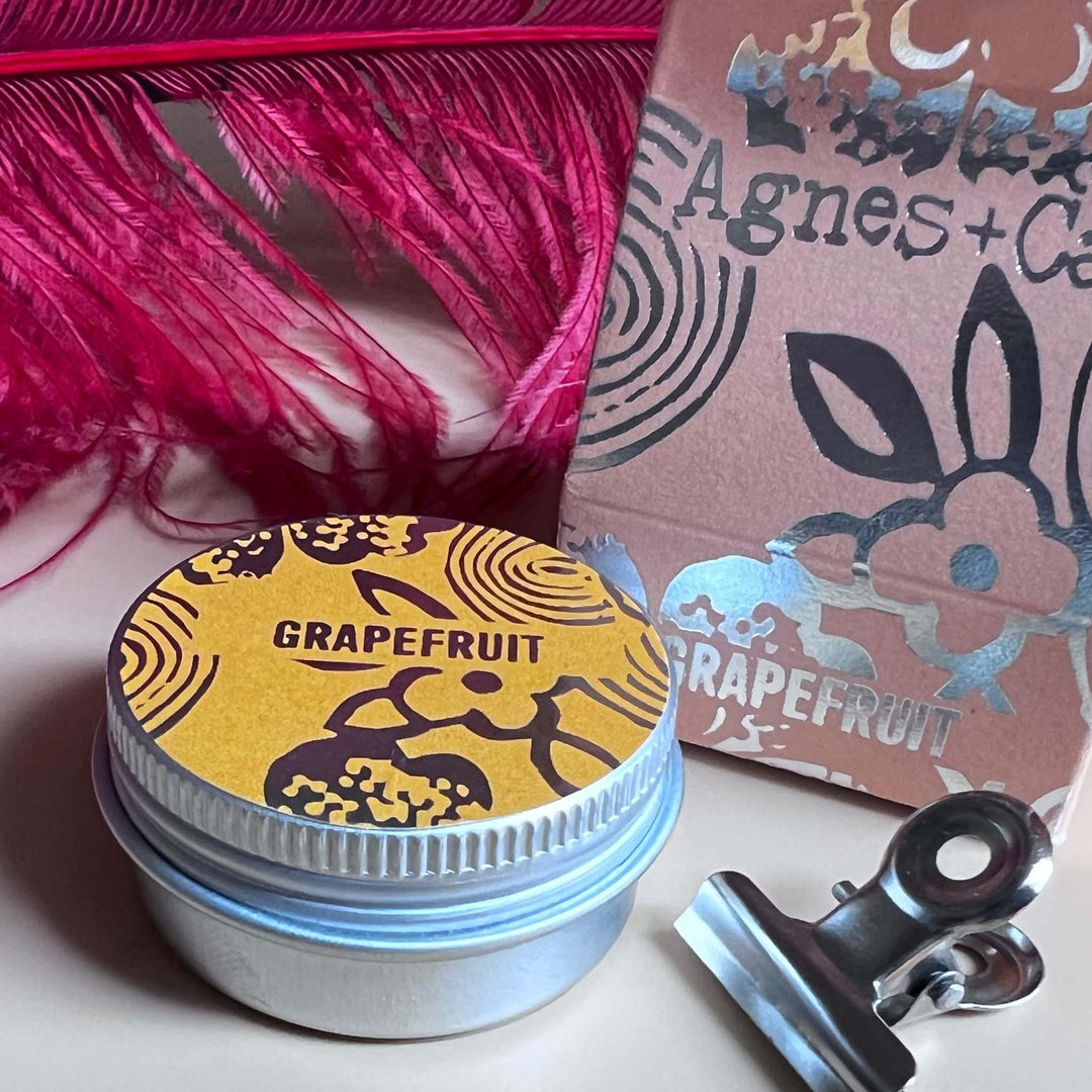 Grapefruit Lip Balm shown outside of package
