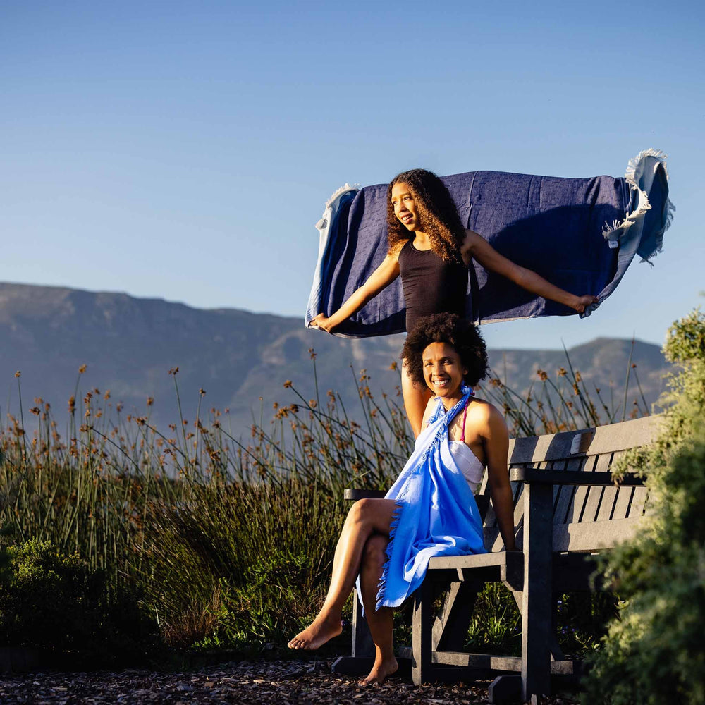 Mother and daughter in the country showing off their quick drying towels
