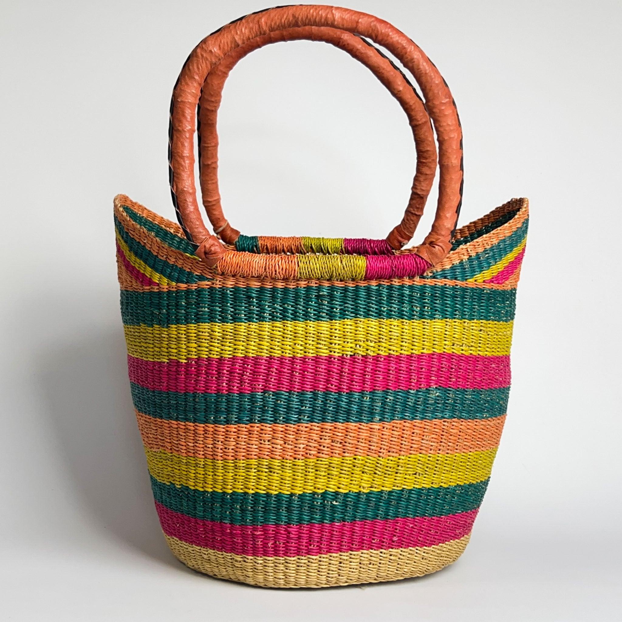African Shopper basket, traditional U shape style. With a stripe design and fun vivid colours and leather handles.