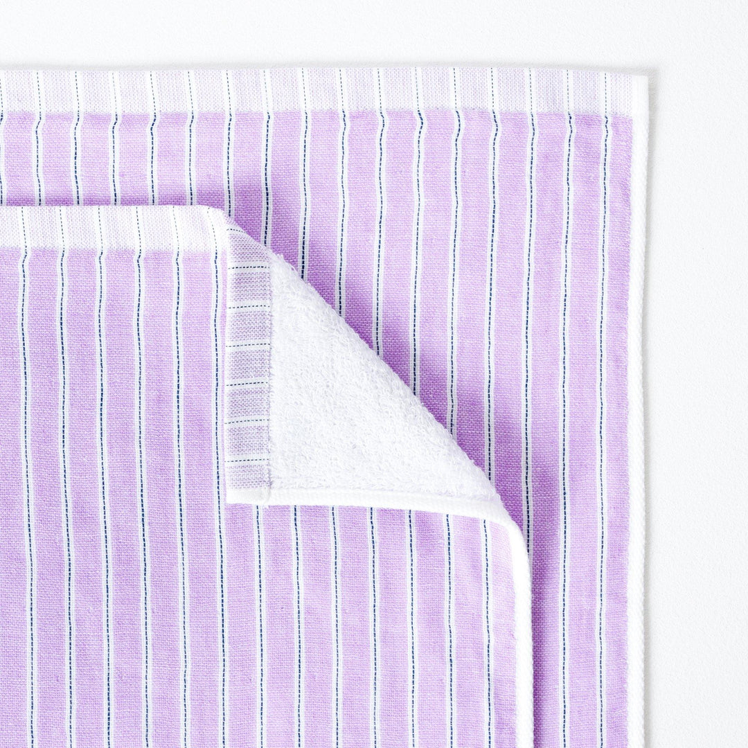 Baby Bath or small Beach Towel in lilac with stripe.  The towel is folded down to show the reverse soft terry pile.