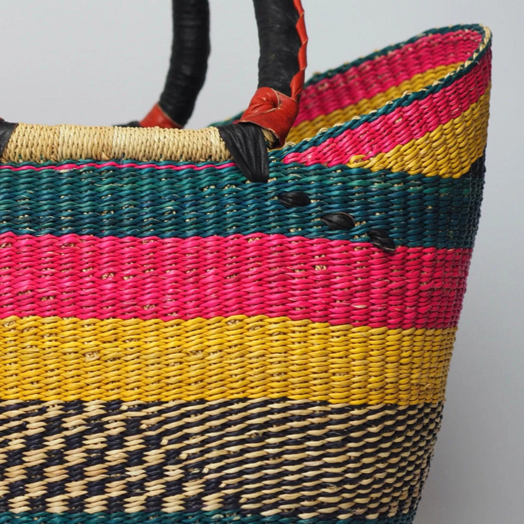 Vibrant Large shopper basket with black leather handles close up view