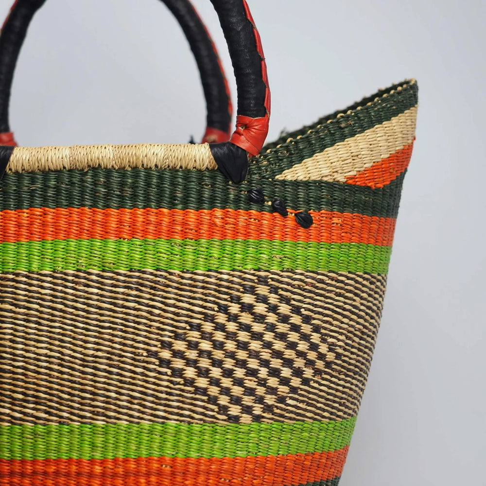 Close up Large U Shopper Basket Orange and Green Stripes with Leather Handles