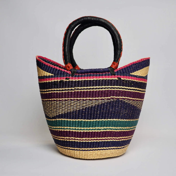 Shopper basket with leather handles in multicoloured design.