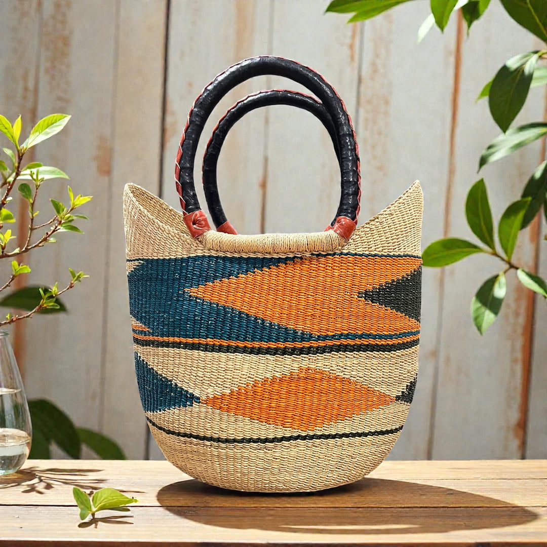 Large teal and orange basket on table surface