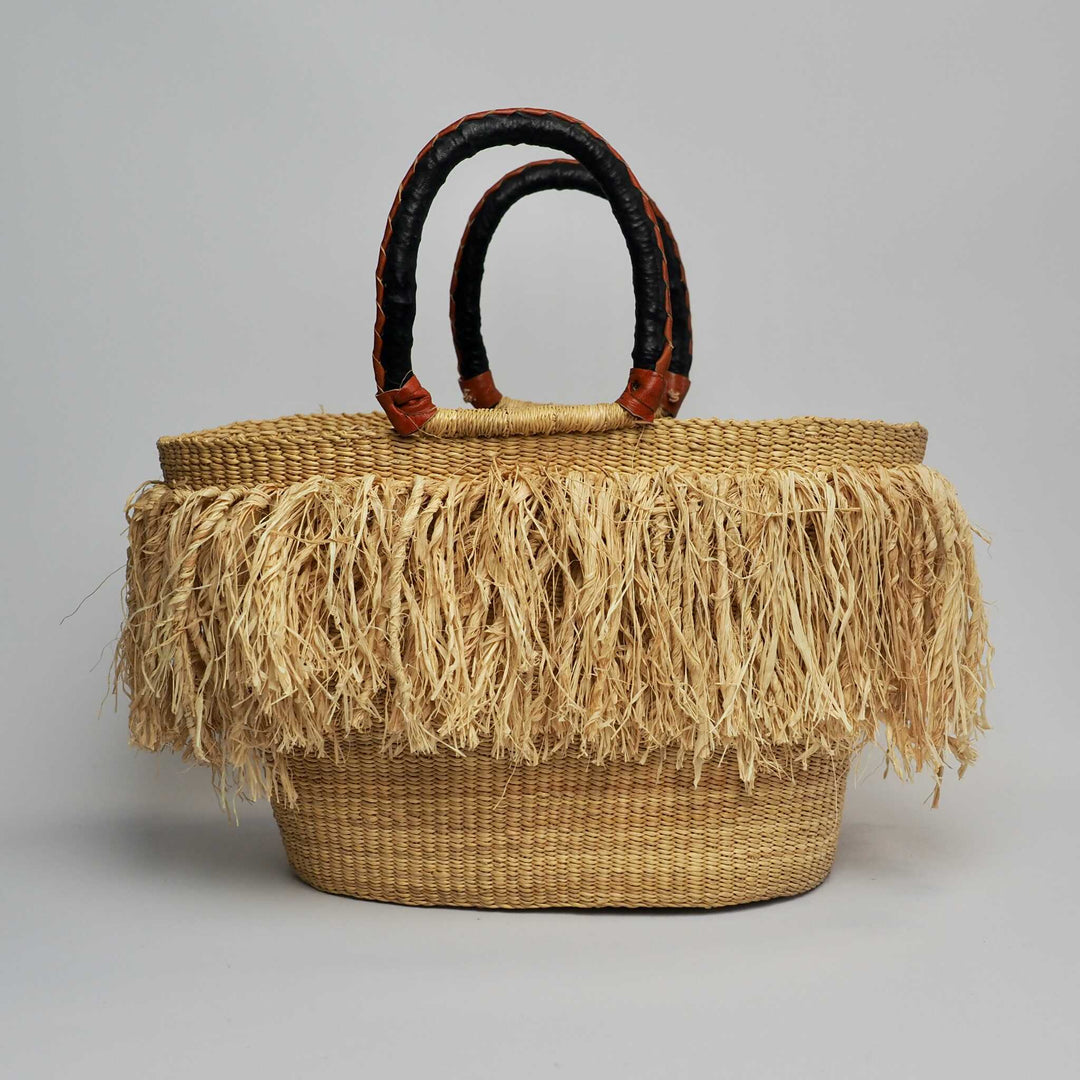 Oblong Rounded Basket with Tassels and Leather Handles