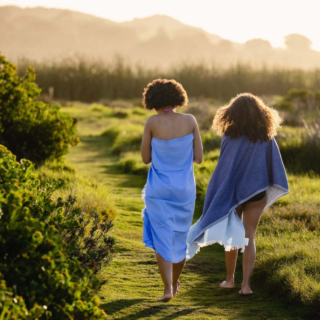 Mother and daughter walking home at the end of the day
