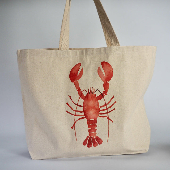 XL Canvas Tote Bag with playful lobster design on the front.  Shown with handles displayed and set against a plain background.  